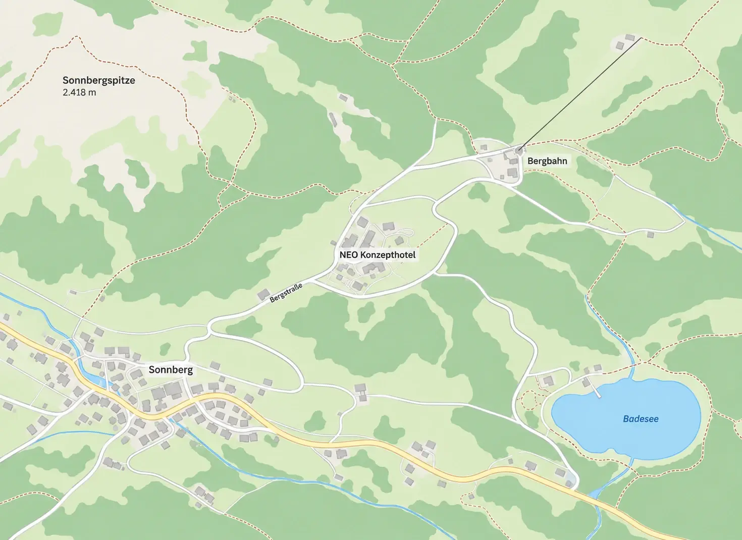 Lageplan: Das NEO Konzepthotel liegt an der Bergstraße über dem Dorf Sonnberg, unterhalb der Sonnbergspitze (2.418 m). Die Bergbahn ist 400 Meter entfernt, der Badesee 6 Kilometer, der Bahnhof 12 Kilometer.